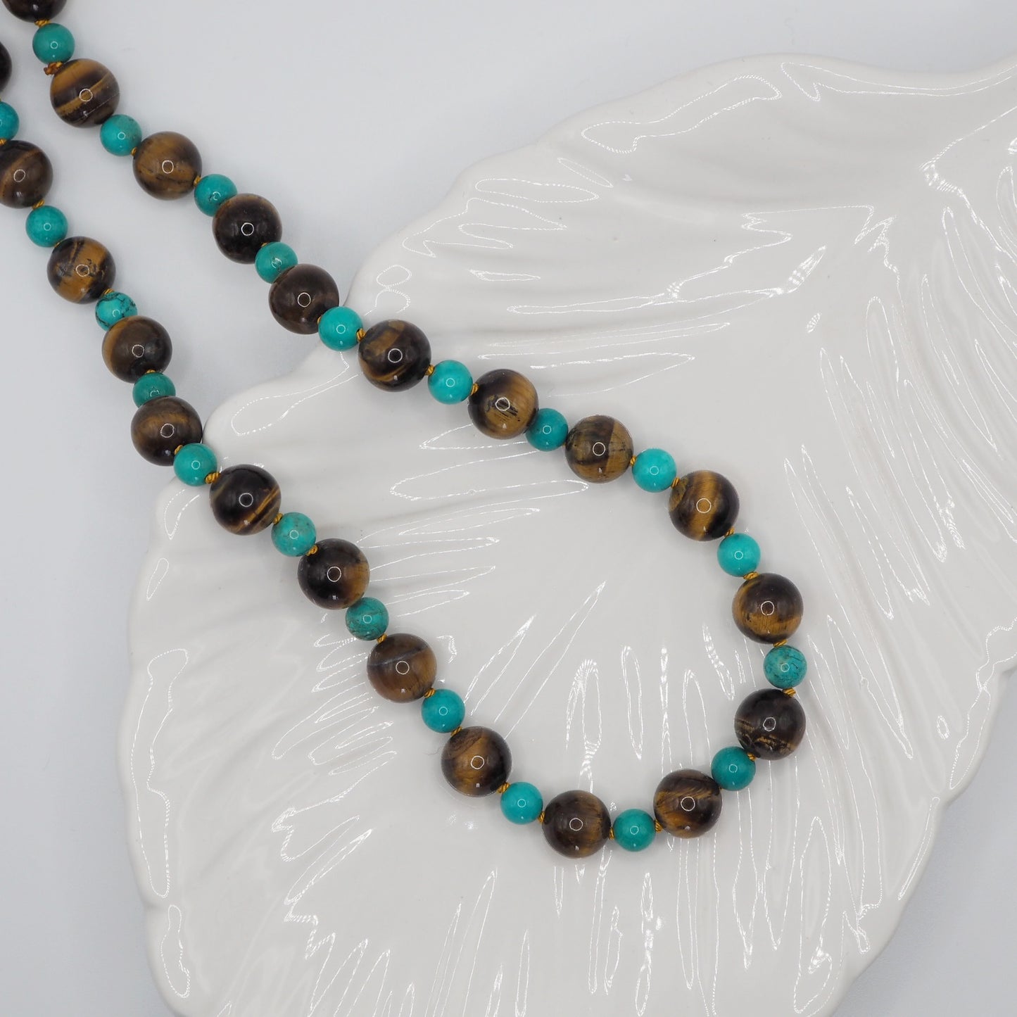 Collana Nodini occhio di tigre turchese