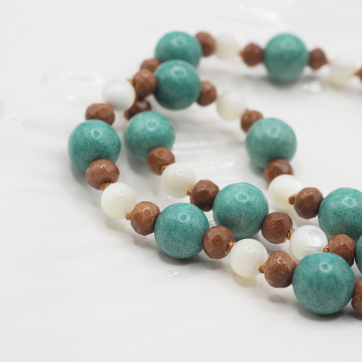 Collana Nodini turchese madreperla