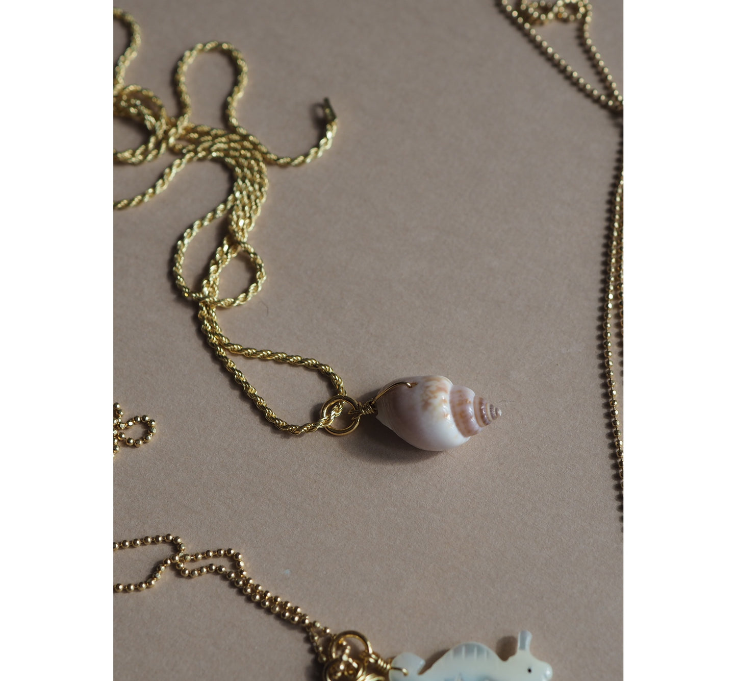 Charm Conchiglia Cipria
