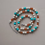 Collana Nodini Beige turchese