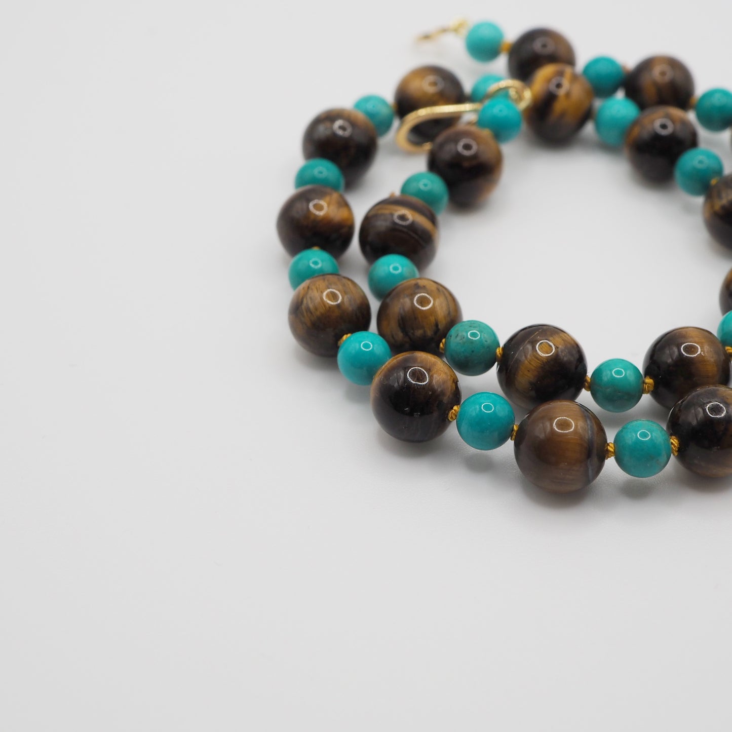 Collana Nodini occhio di tigre turchese