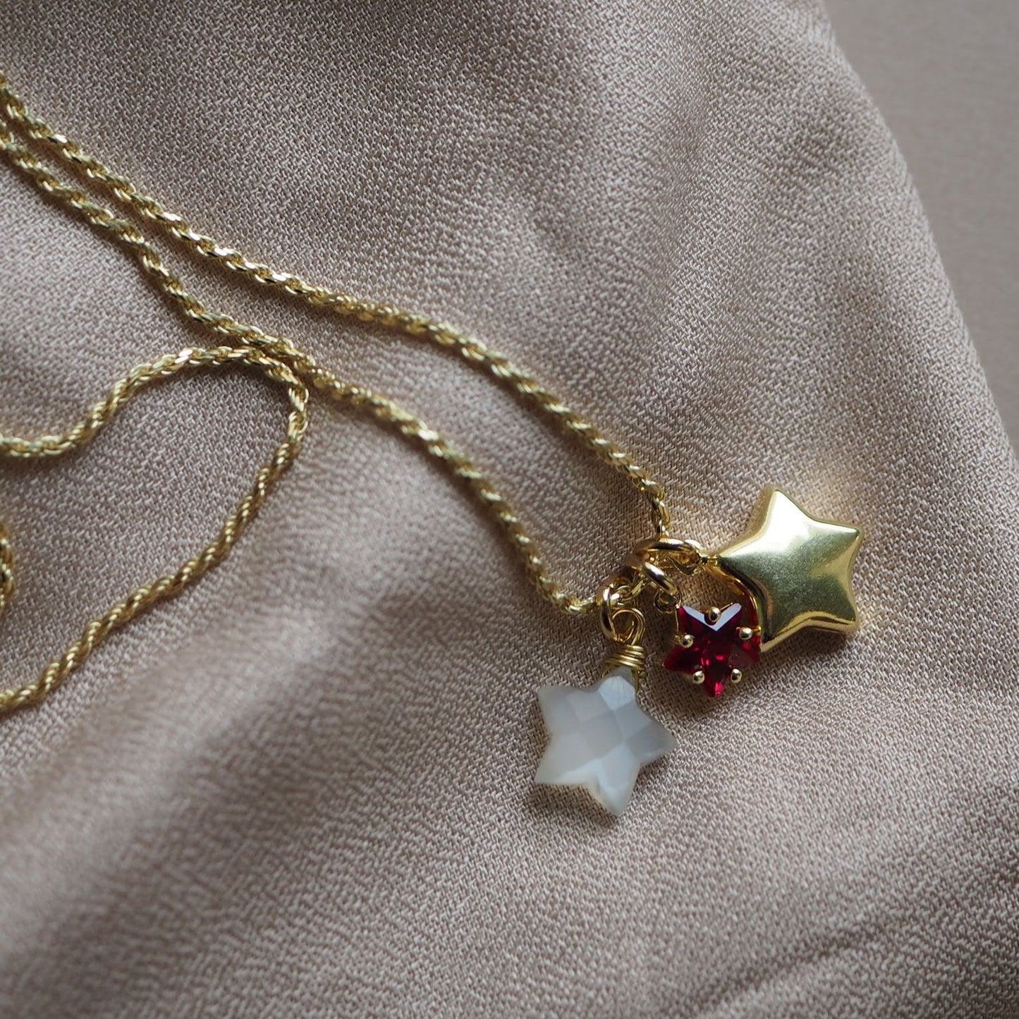 Charm Stella pietra